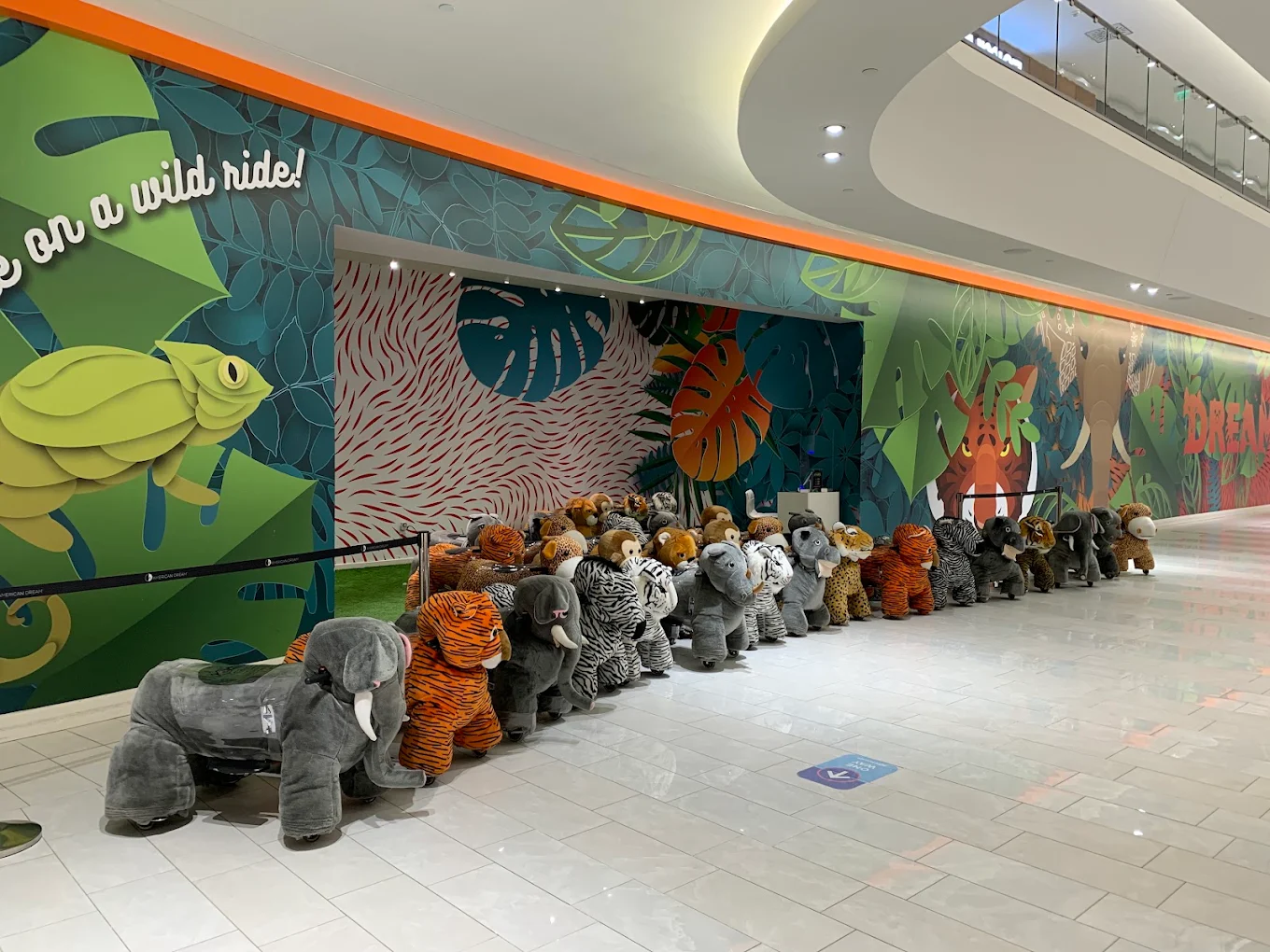 Dream Riders storefront and plush animal fleet at American Dream